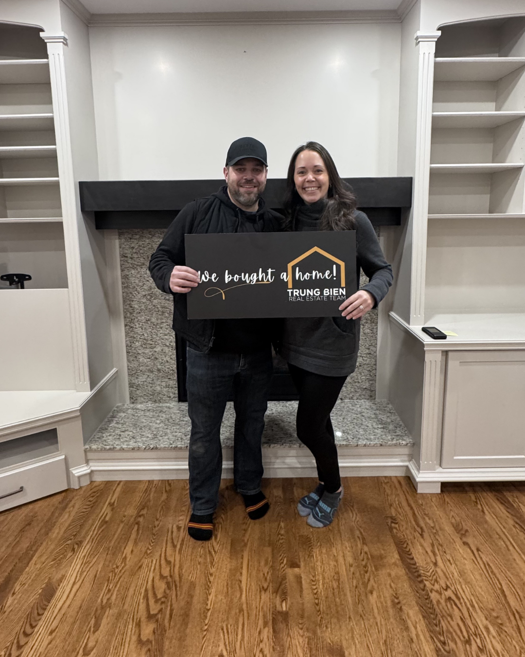 Trung Bien with client after buying their home