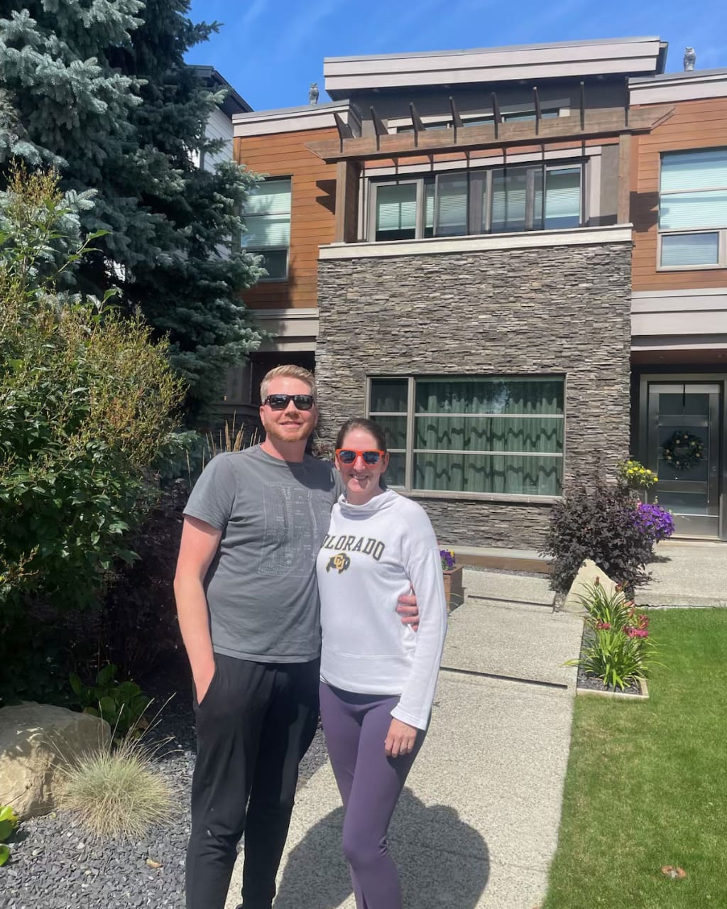 Trung Bien with client after buying their home